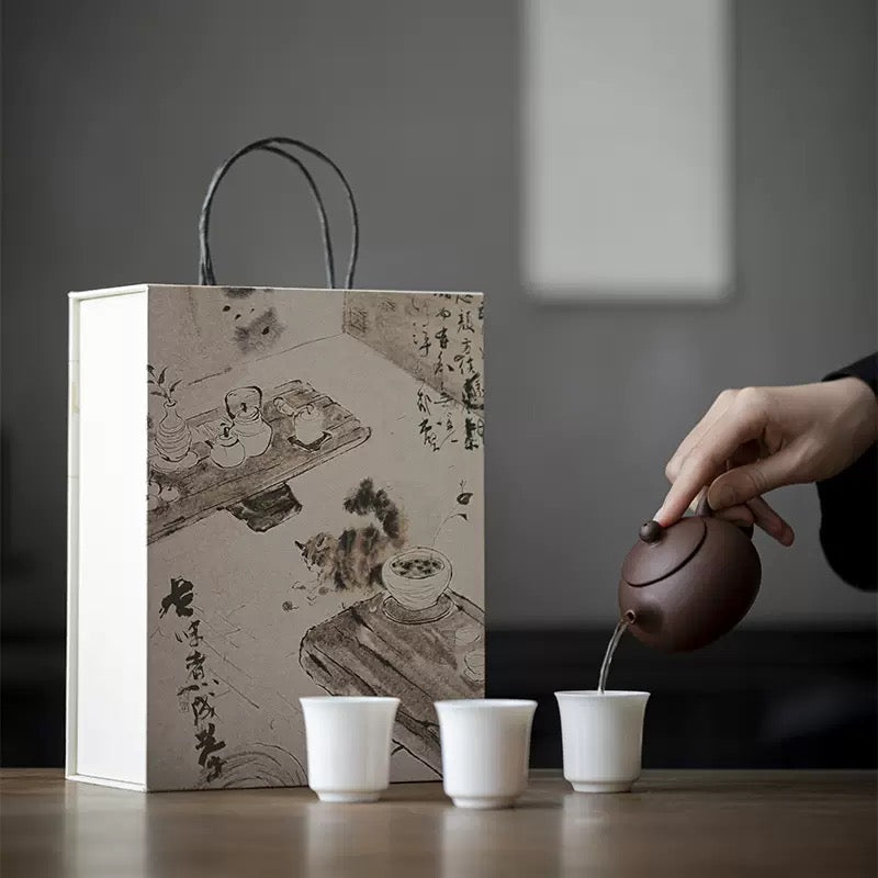 Teapot with 3 cups in gift bag