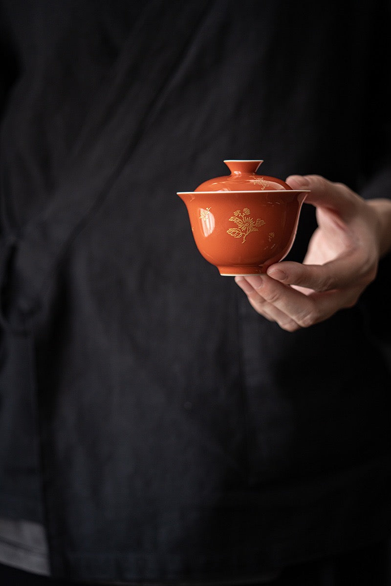 Red Tea Bowl In hand 